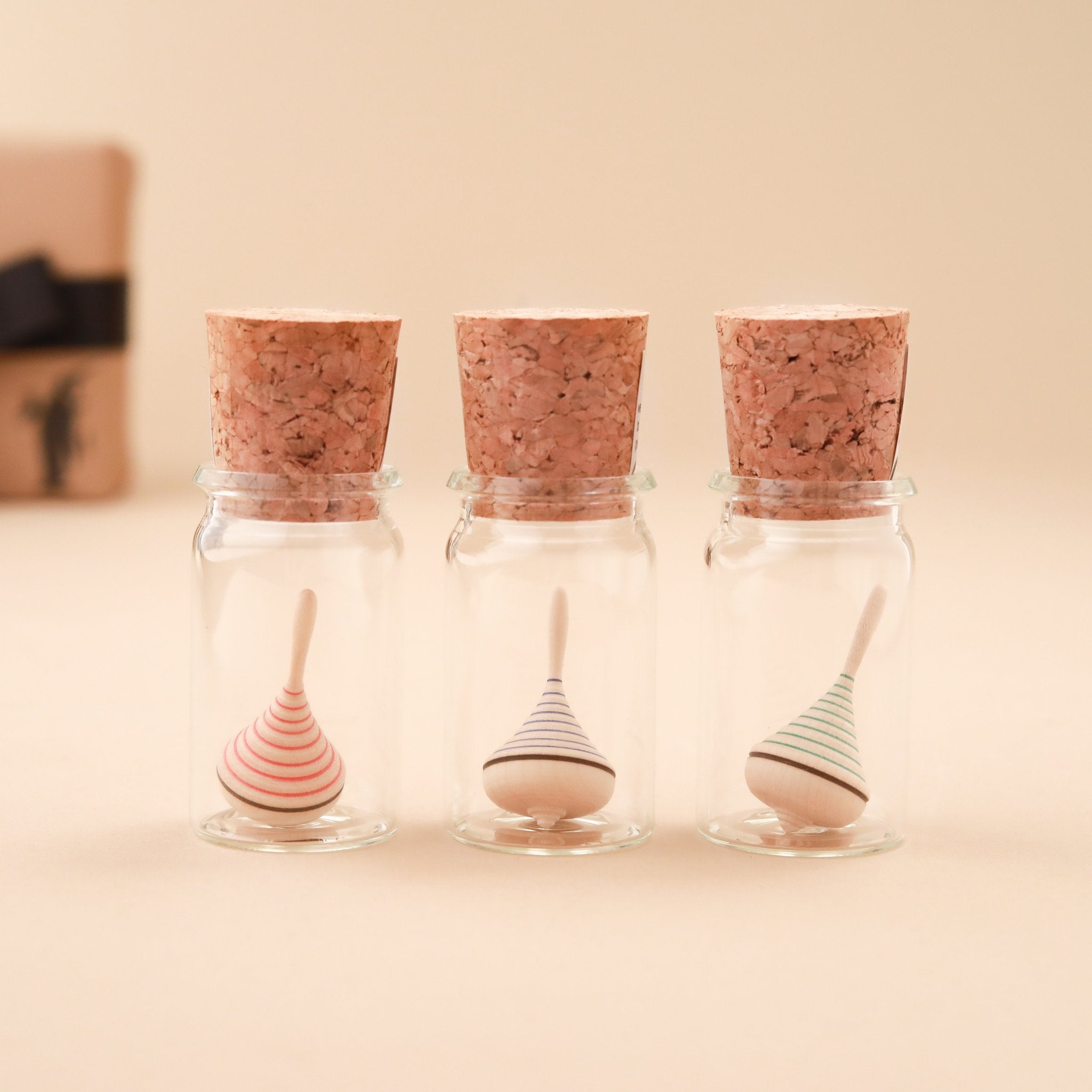 Mini Campanola Wooden Spinning Top | Glass Display
