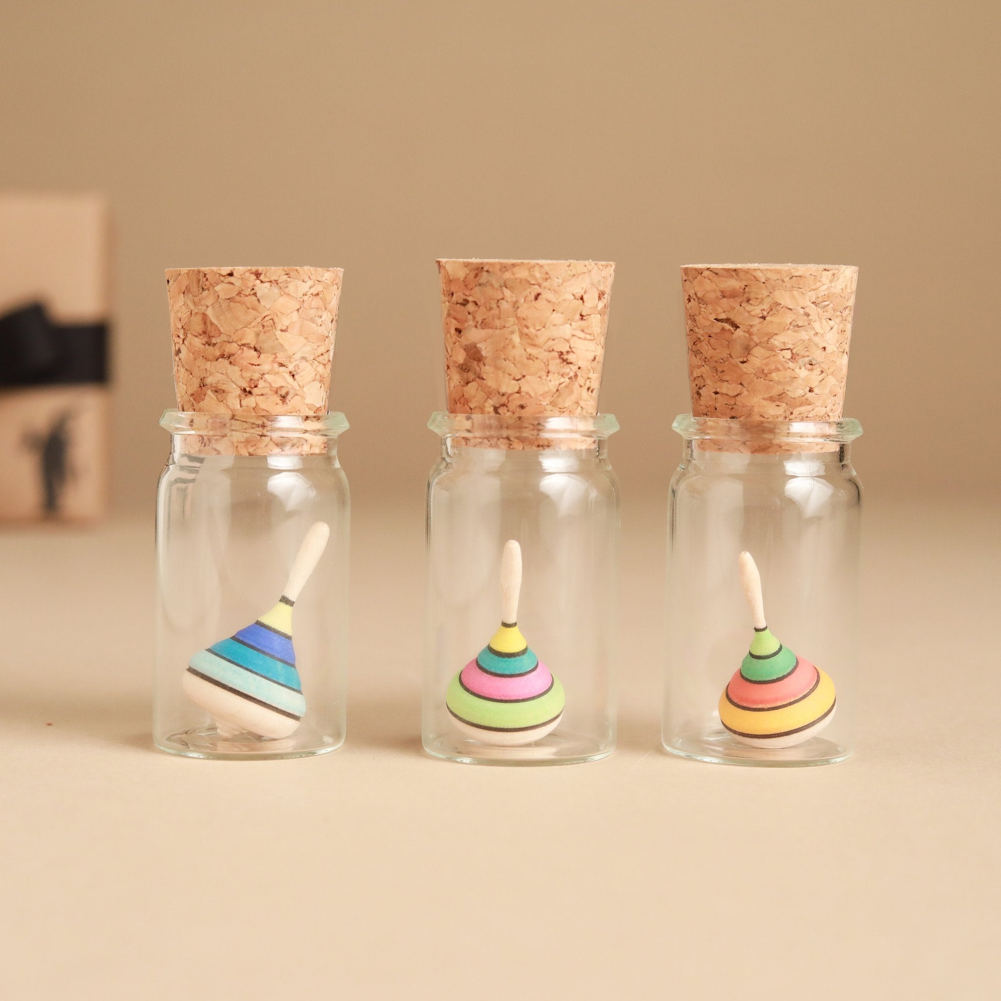Mini Harlequin Wooden Spinning Top | Glass Display