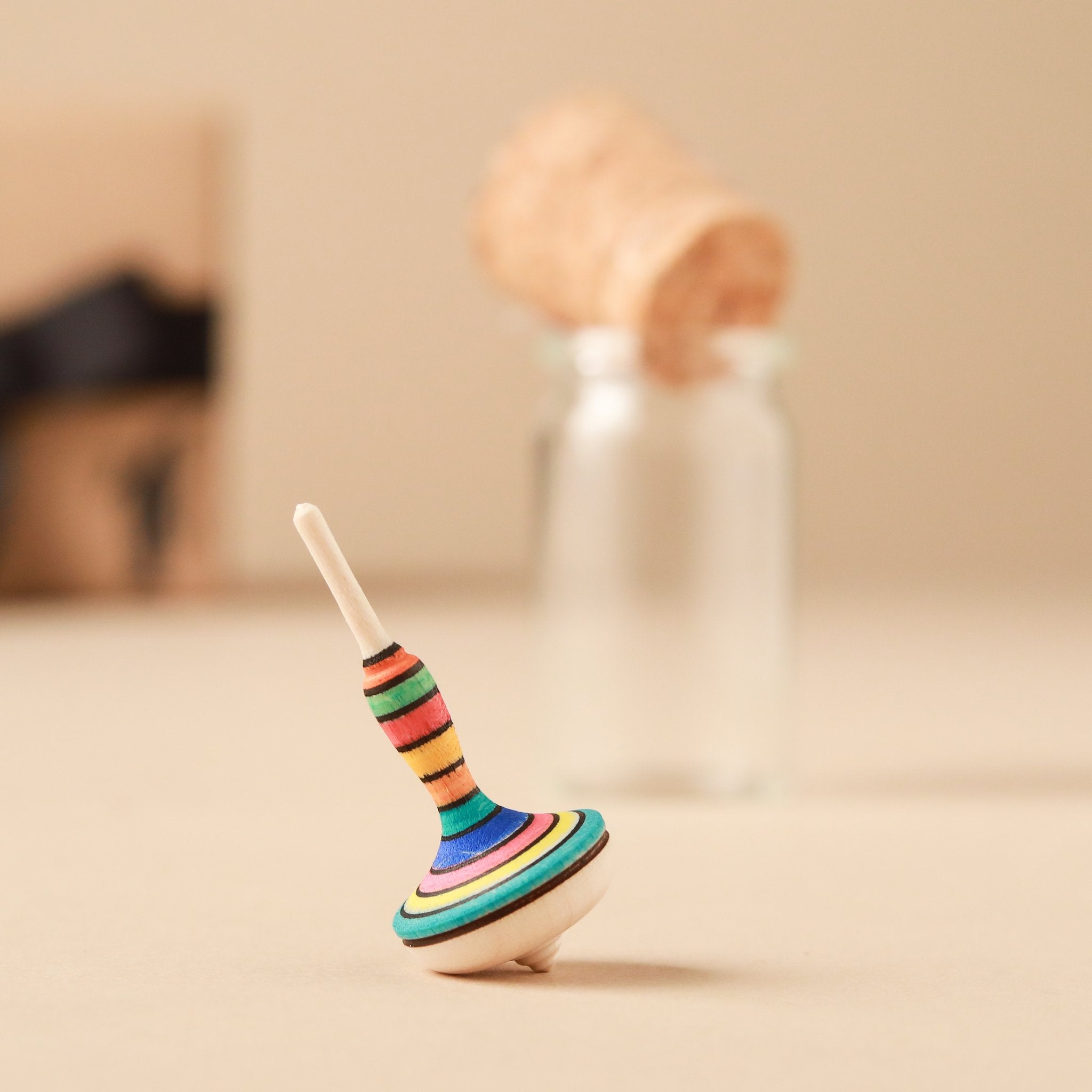 Mini Mona Lotte Wooden Spinning Top | Glass Display