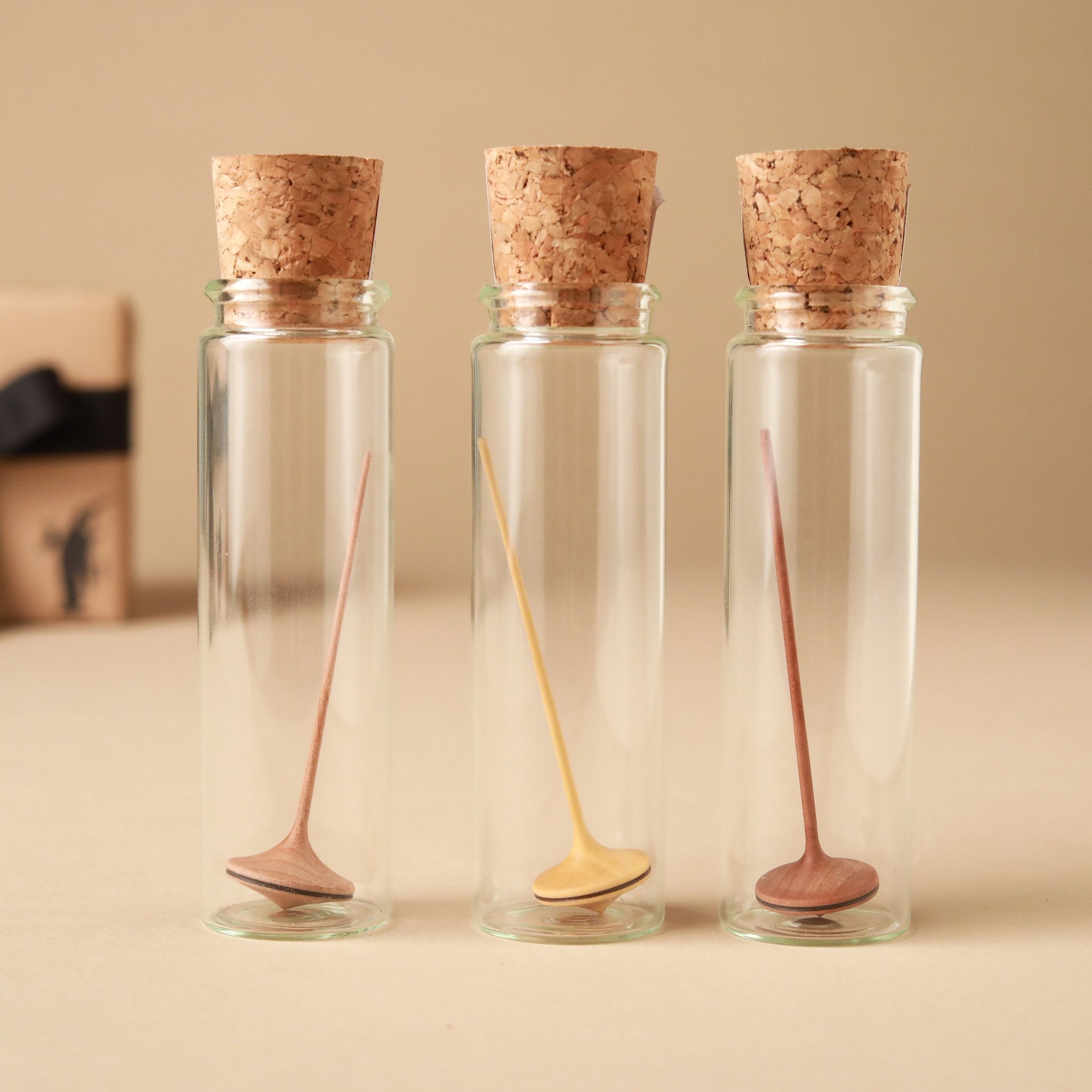 Mini Trumpo Wooden Spinning Top | Glass Display