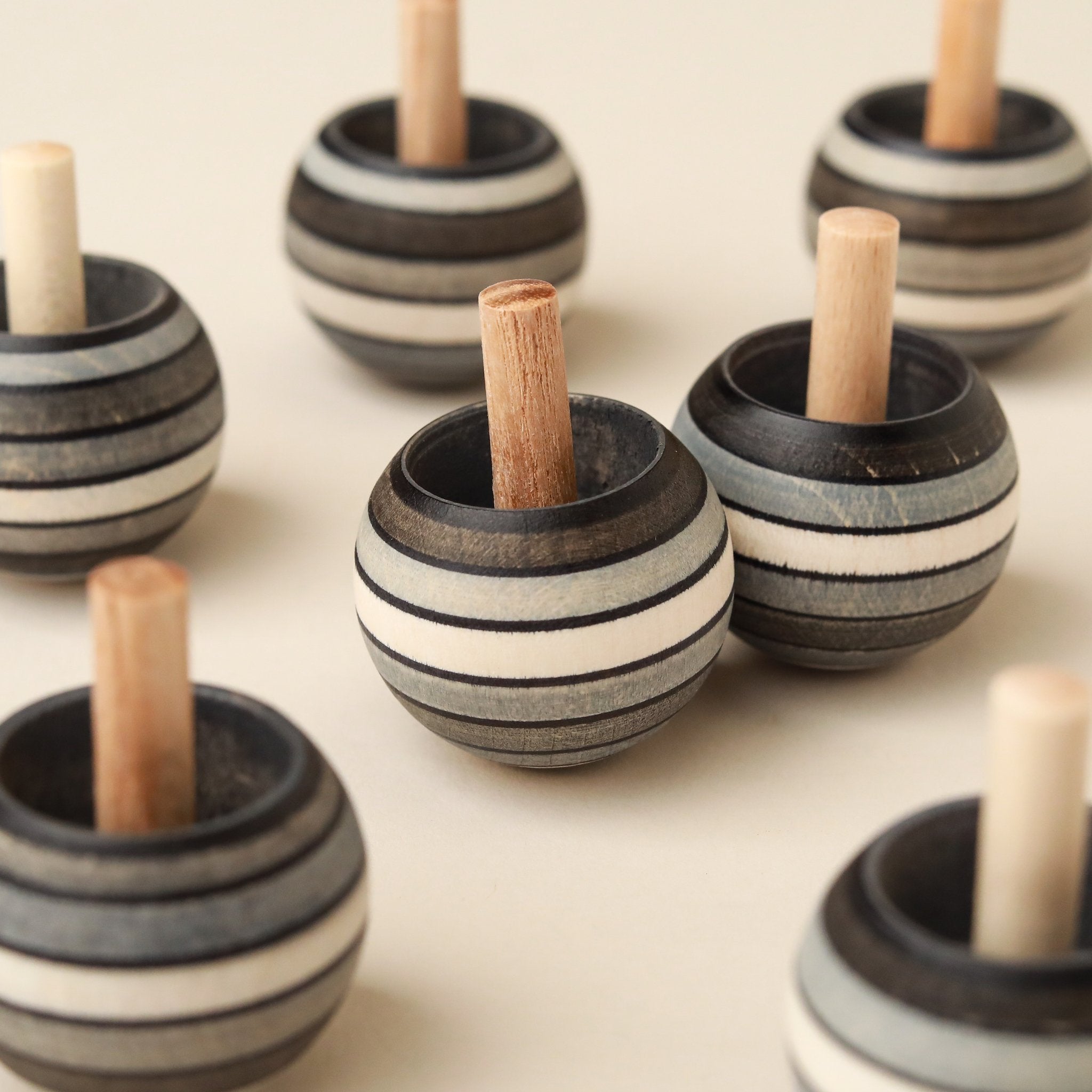 Upside-Down Wooden Spinning Top | Graphite Stripes